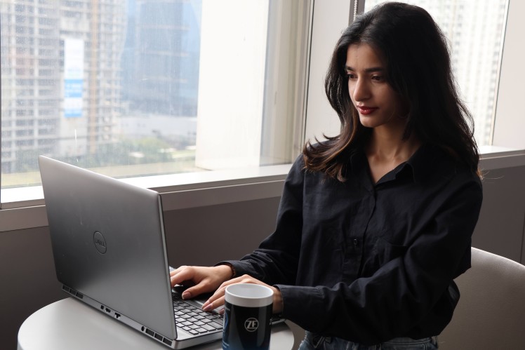 Student applying for early career opportunities and preparing for career journey on a laptop