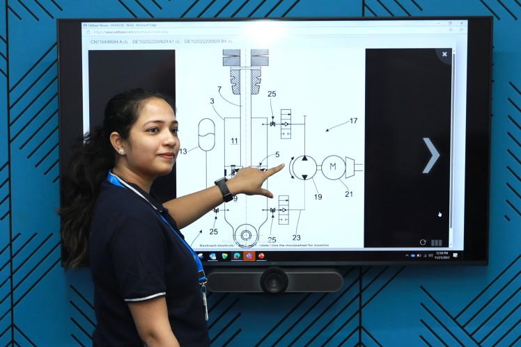 Graduate trainee learning engineering concepts through structured training and technical guidance in a professional environment