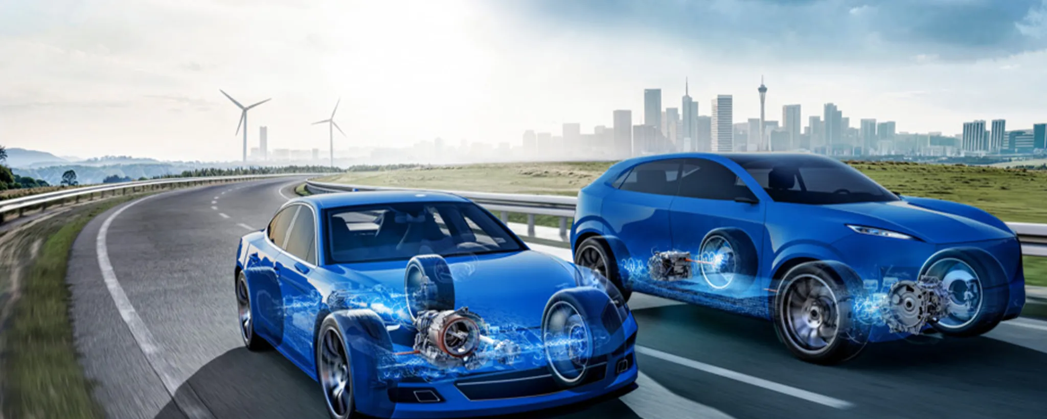 Gläsernes Elektroauto auf einer Landstraße mit sichtbar dargestelltem E-Antrieb und Hochvoltbatterie.