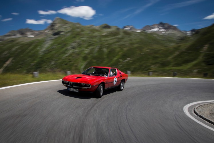 Alfa Romeo Montreal driving through serpentines