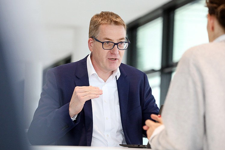 Dr. Rolf Reinema during an interview