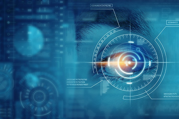 Blue digital image with orange light coming out of eye