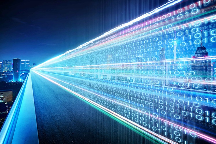 Blue digital image of skyline with coding overlaid