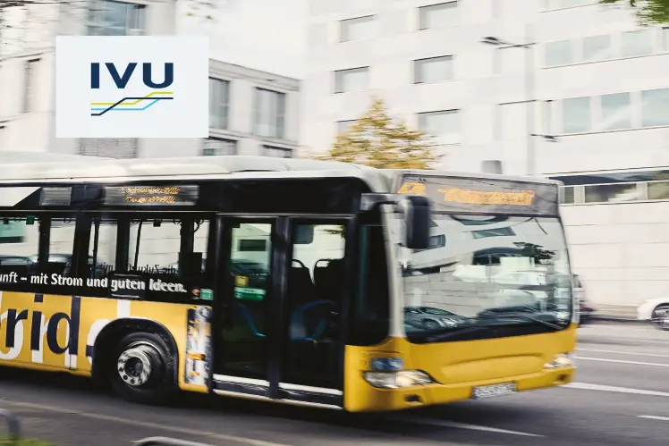 Yellow articulated bus on the street