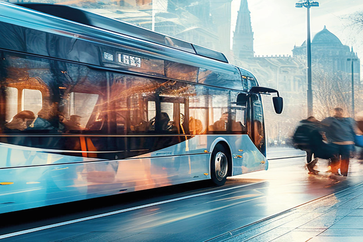 City bus on the street with pedestrians