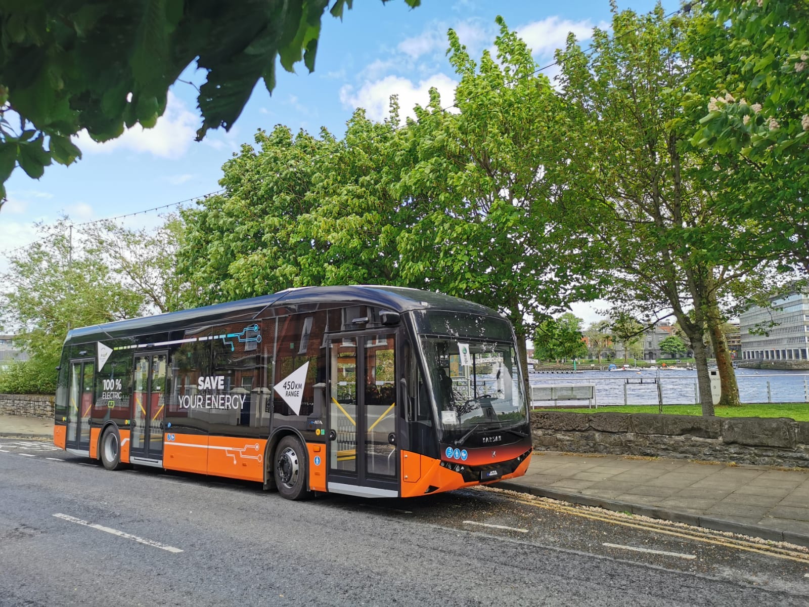 Black and orange Karsan city bus