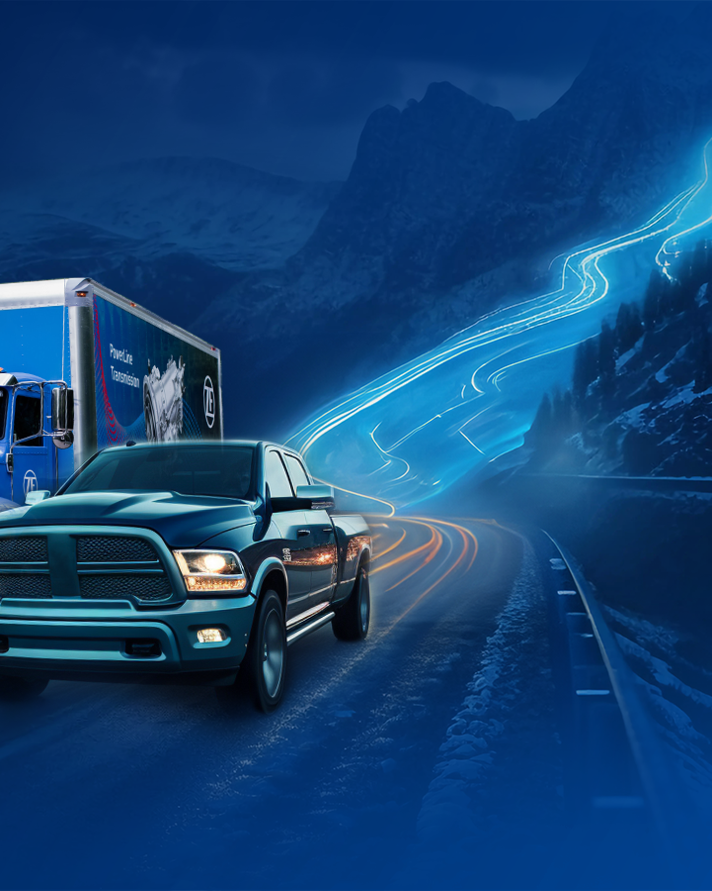 Medium-duty box truck with ZF PowerLine and Dodge Ram pickup truck on mountainous highway.