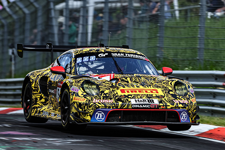 GT racing car cornering on the track
