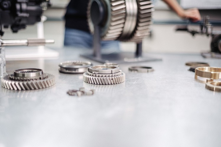 Silver vehicle parts on table