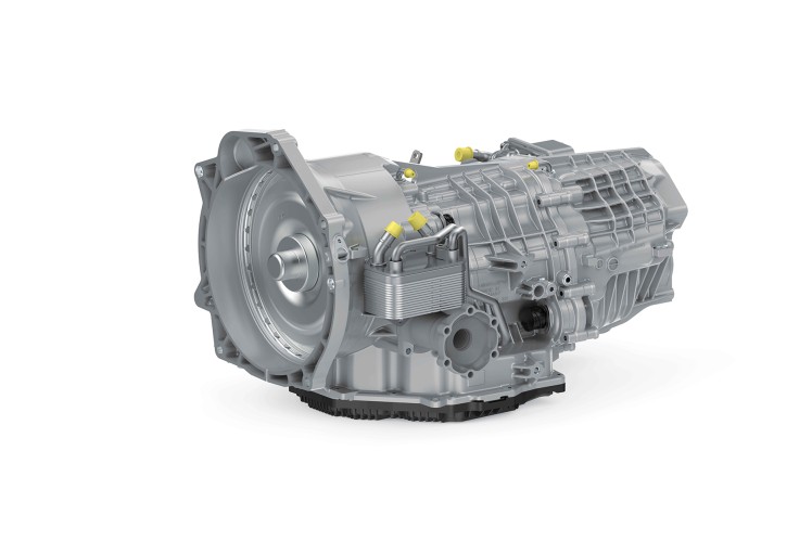 Dual-clutch silver transmission on white background