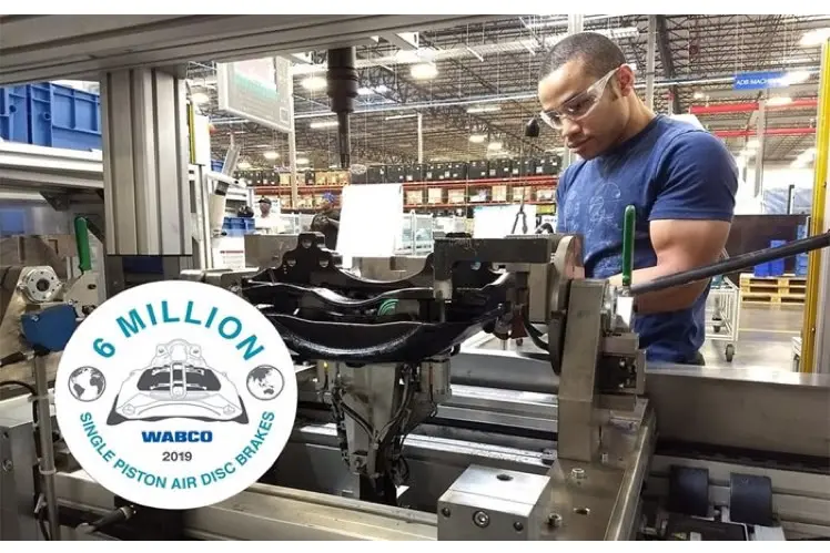 MAXXUS worker with sticker